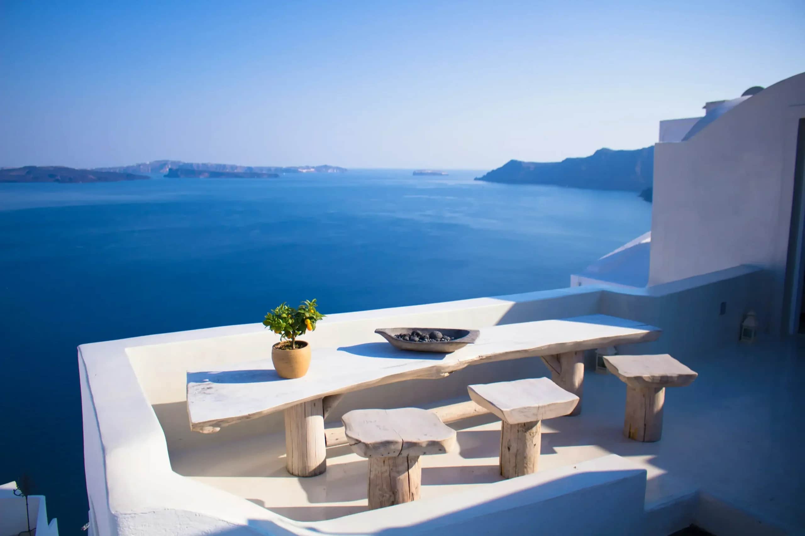 Luxurious dining table overlooking the Greek islands and ocean